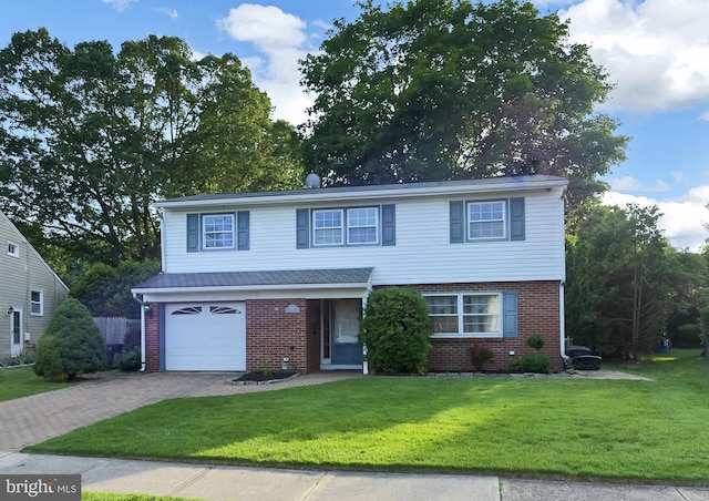 15 Constance Dr, Hamilton, NJ 08620 - view of front of house with brick siding, decorative driveway, and a front lawn