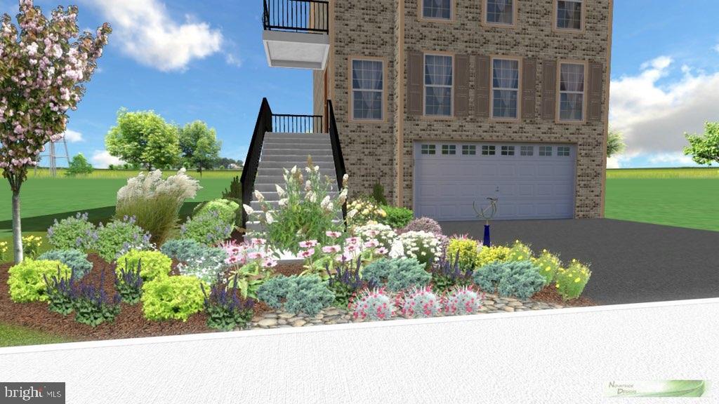42634 Lancaster Ridge Ter, Chantilly, VA 20152 - view of front facade featuring brick siding, stairway, an attached garage, and asphalt driveway
