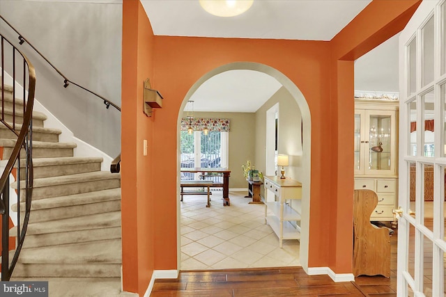 615 Beinhower Rd, Etters, PA 17319 - foyer with arched walkways, hardwood / wood-style floors, and stairs