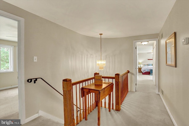 615 Beinhower Rd, Etters, PA 17319 - corridor with an upstairs landing, carpet floors, and a chandelier
