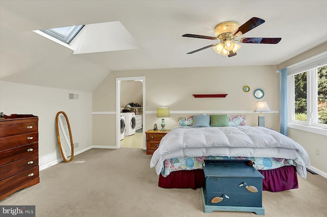 615 Beinhower Rd, Etters, PA 17319 - carpeted bedroom featuring washer and dryer, vaulted ceiling, ceiling fan, and a skylight