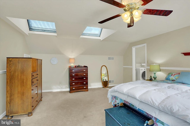 615 Beinhower Rd, Etters, PA 17319 - bedroom with a skylight, washer / dryer, vaulted ceiling, light carpet, and a ceiling fan