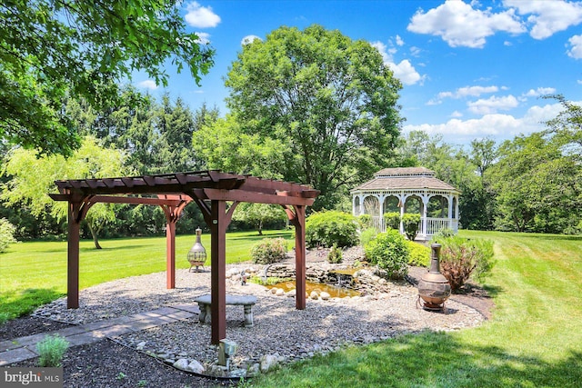 615 Beinhower Rd, Etters, PA 17319 - view of grassy yard with a gazebo, a pergola, and view of wooded area