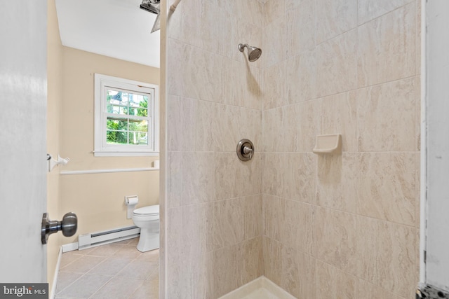 643 Comly Ave, Langhorne, PA 19047 - bathroom featuring a baseboard heating unit, tiled shower, and tile patterned flooring
