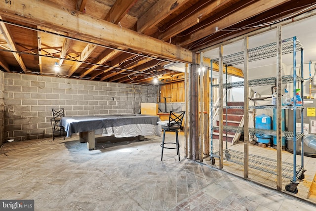 643 Comly Ave, Langhorne, PA 19047 - unfinished below grade area with a water pressure tank, electric water heater, and concrete block wall