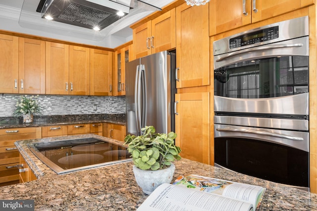 1125 K St NE, Washington, DC 20002 - kitchen with stainless steel appliances, dark stone countertops, glass insert cabinets, and tasteful backsplash