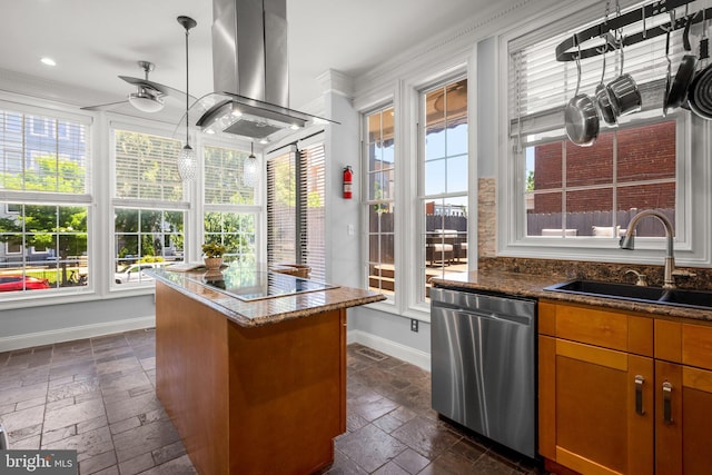 1125 K St NE, Washington, DC 20002 - kitchen featuring dishwasher, stone tile floors, wall chimney exhaust hood, crown molding, and healthy amount of natural light