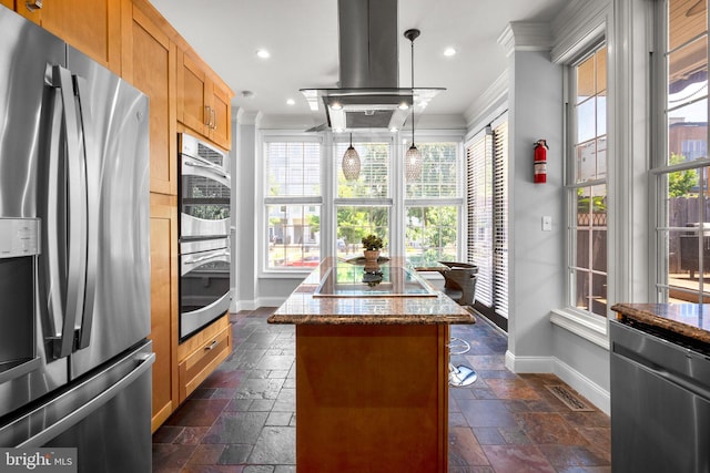1125 K St NE, Washington, DC 20002 - kitchen with stainless steel appliances, crown molding, a center island, island exhaust hood, and stone tile flooring