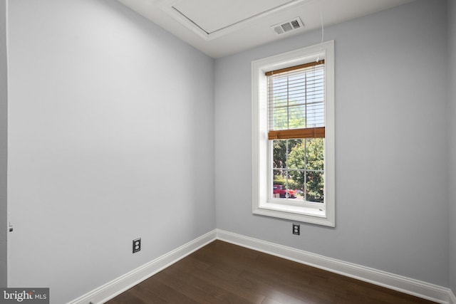 1125 K St NE, Washington, DC 20002 - unfurnished room featuring dark wood-type flooring and attic access