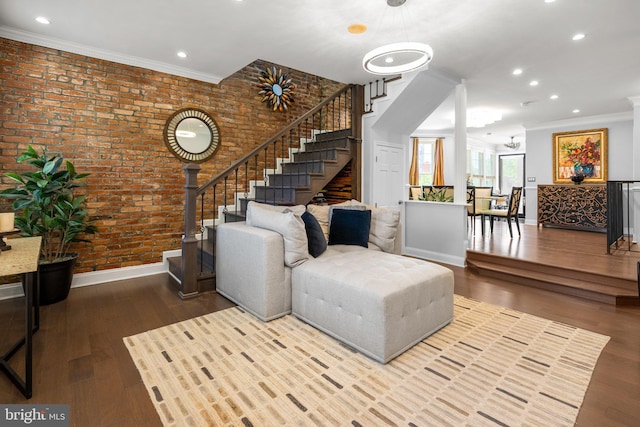 1125 K St NE, Washington, DC 20002 - living room with stairs, ornamental molding, recessed lighting, wood finished floors, and brick wall