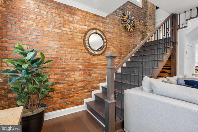 1125 K St NE, Washington, DC 20002 - staircase with wood finished floors and brick wall
