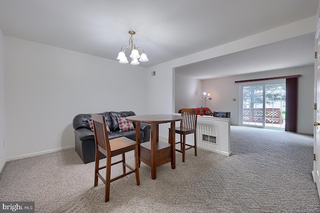 1206 Fredrick Blvd, Reading, PA 19605 - carpeted dining room with a chandelier and baseboards