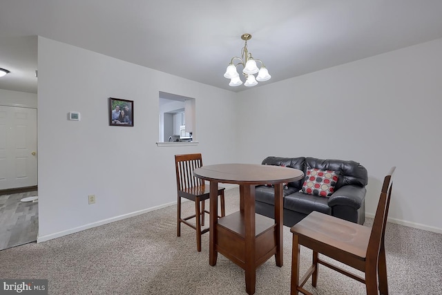 1206 Fredrick Blvd, Reading, PA 19605 - dining space featuring light colored carpet and a chandelier