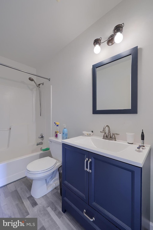 1206 Fredrick Blvd, Reading, PA 19605 - full bathroom featuring vanity, shower / bath combination, and wood finished floors