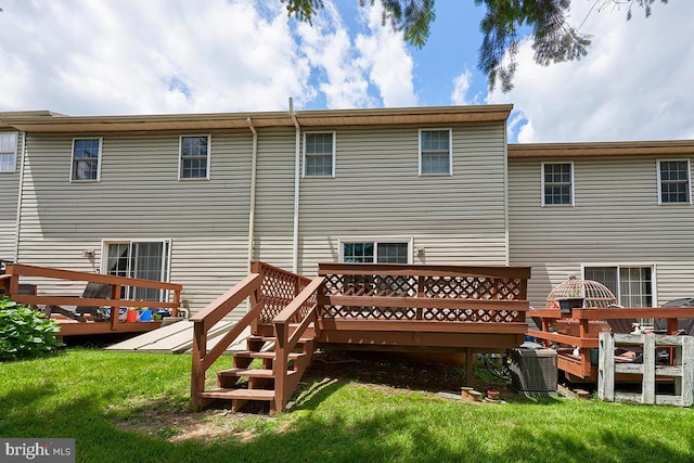 1206 Fredrick Blvd, Reading, PA 19605 - rear view of property featuring a deck and a yard