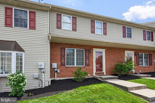 1206 Fredrick Blvd, Reading, PA 19605 - townhome / multi-family property featuring brick siding