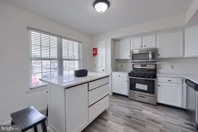 1206 Fredrick Blvd, Reading, PA 19605 - kitchen featuring stainless steel appliances, white cabinets, and light countertops