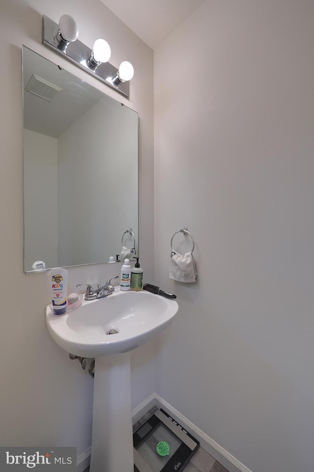 1206 Fredrick Blvd, Reading, PA 19605 - bathroom featuring baseboards