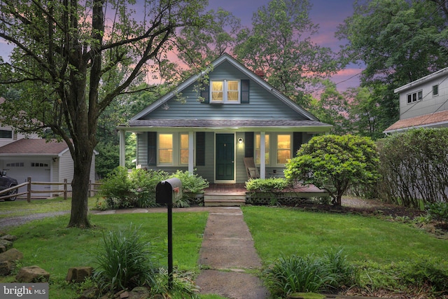 148 Reservoir Rd, Hopewell, NJ 08525 - view of front facade featuring a porch and a garage