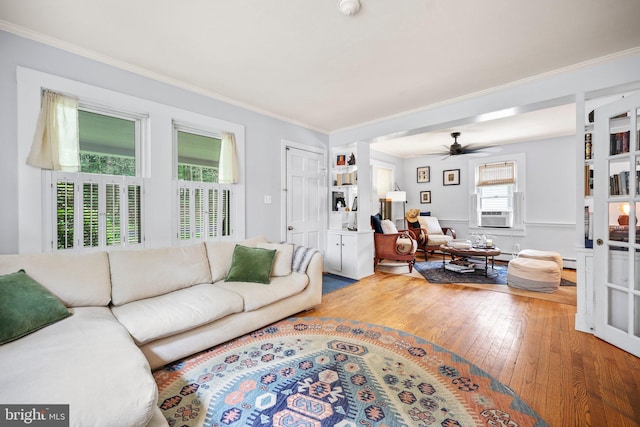 148 Reservoir Rd, Hopewell, NJ 08525 - living room with ornamental molding, hardwood / wood-style flooring, ceiling fan, a baseboard radiator, and cooling unit