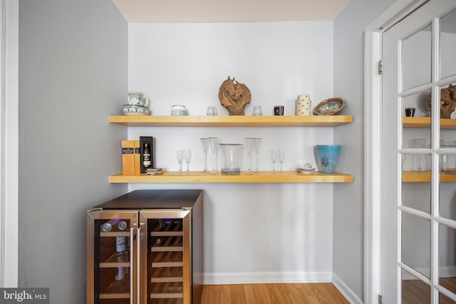 148 Reservoir Rd, Hopewell, NJ 08525 - indoor dry bar with beverage cooler and wood finished floors
