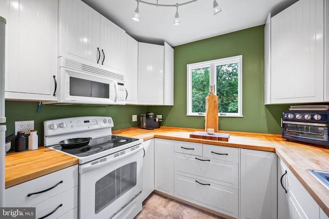148 Reservoir Rd, Hopewell, NJ 08525 - kitchen with butcher block counters, white appliances, and white cabinetry