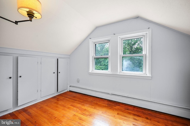 148 Reservoir Rd, Hopewell, NJ 08525 - bonus room with baseboard heating, vaulted ceiling, and light wood-style floors