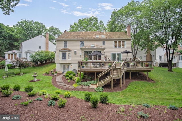 15508 Summer Grove Ct, Gaithersburg, MD 20878 - rear view of house with a deck, a yard, stairs, a gazebo, and a chimney