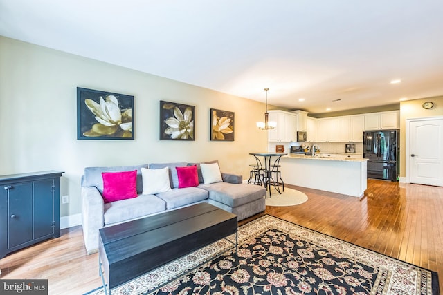 231 Caleb Dr, West Chester, PA 19382 - living area featuring light wood finished floors and recessed lighting