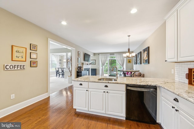 231 Caleb Dr, West Chester, PA 19382 - kitchen featuring dishwasher, a peninsula, white cabinetry, a chandelier, and dark wood-style flooring