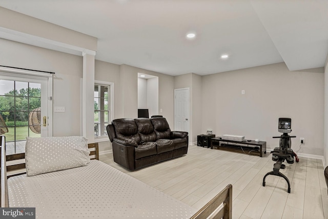 19874 La Bete Ct, Ashburn, VA 20147 - living area with wood finished floors and recessed lighting