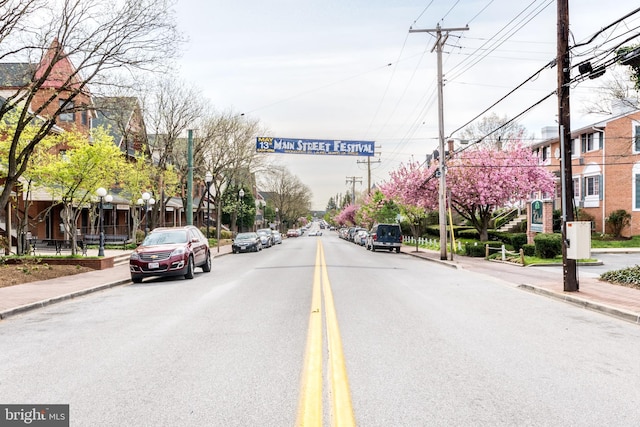 410 Main St Unit 9, Laurel, MD 20707 - view of asphalt street with sidewalks, curbs, and street lights