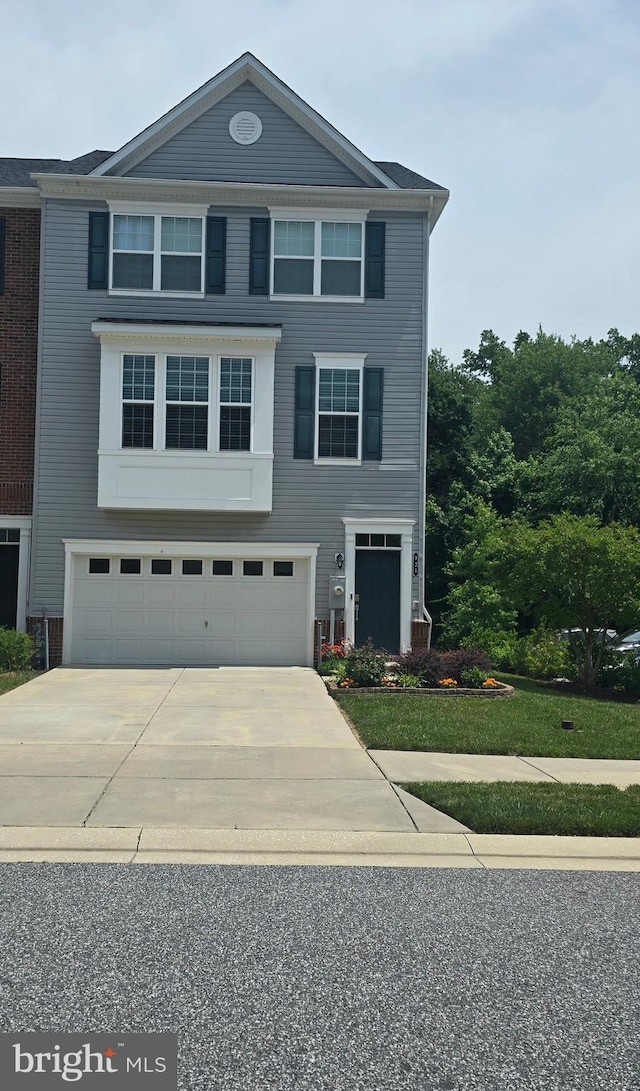 921 Sandy Run Rd, Baltimore, MD 21220 - view of front facade featuring an attached garage and driveway