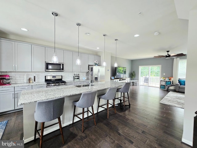 921 Sandy Run Rd, Baltimore, MD 21220 - kitchen featuring stainless steel appliances, a spacious island, decorative backsplash, a kitchen bar, and recessed lighting