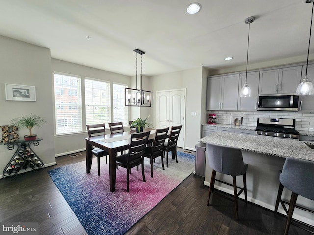 921 Sandy Run Rd, Baltimore, MD 21220 - dining space featuring a chandelier, dark wood finished floors, and recessed lighting