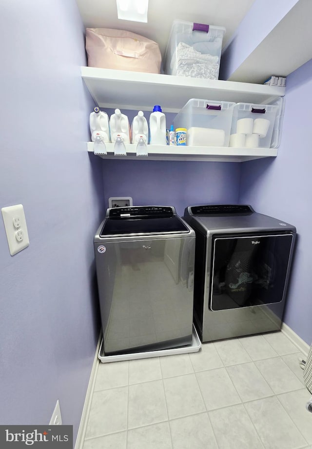 921 Sandy Run Rd, Baltimore, MD 21220 - laundry area featuring washer and dryer and tile patterned floors