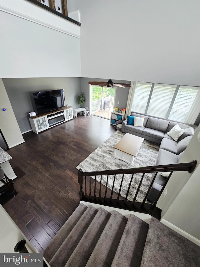 921 Sandy Run Rd, Baltimore, MD 21220 - living room featuring a ceiling fan, wood finished floors, and a high ceiling