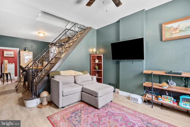 3567 Joyce St, Philadelphia, PA 19134 - living area featuring stairway, wood finished floors, and a ceiling fan