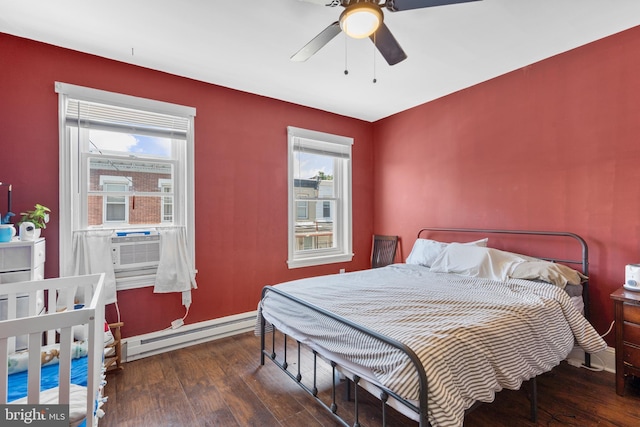 3567 Joyce St, Philadelphia, PA 19134 - bedroom featuring baseboard heating, multiple windows, and hardwood / wood-style floors