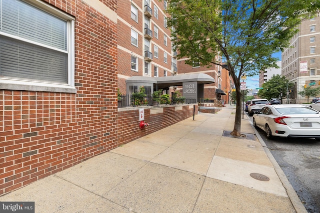 1101 Saint Paul St Unit 603, Baltimore, MD 21202 - view of street featuring sidewalks, street lights, and curbs
