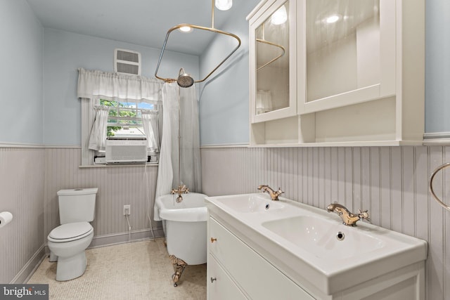 101 Cliff Ter, Wyncote, PA 19095 - full bathroom with wainscoting, a tub, double vanity, and a shower