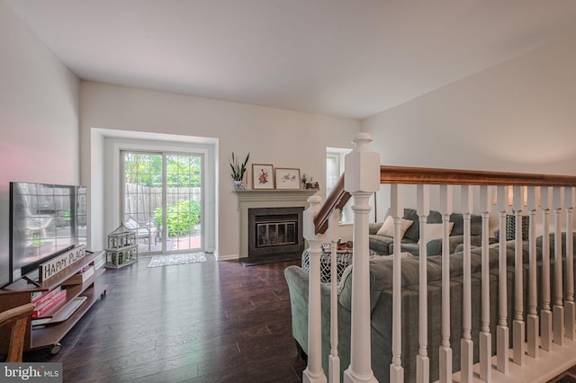 642 Lamplighter Way, Hockessin, DE 19707 - living area featuring wood finished floors and a glass covered fireplace