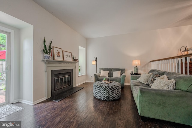 642 Lamplighter Way, Hockessin, DE 19707 - living area featuring dark wood-style flooring and a glass covered fireplace