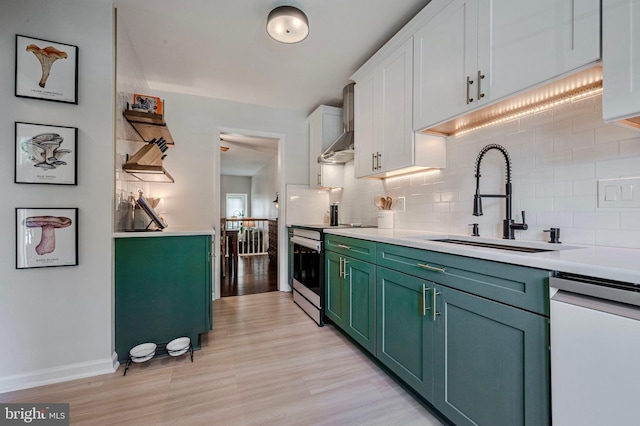 642 Lamplighter Way, Hockessin, DE 19707 - kitchen featuring white dishwasher, electric stove, light countertops, and green cabinets