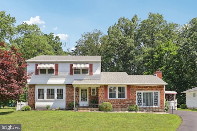 21 Hemmings Way, Lawnside, NJ 08045 - view of front of house featuring a chimney and brick siding
