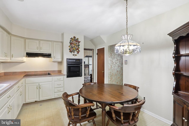 21 Hemmings Way, Lawnside, NJ 08045 - dining space with a chandelier and light floors