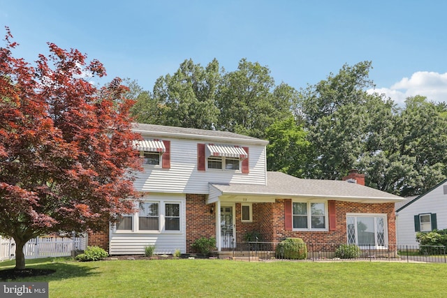 21 Hemmings Way, Lawnside, NJ 08045 - view of front facade featuring a chimney and brick siding