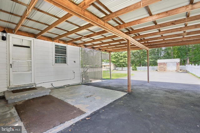 21 Hemmings Way, Lawnside, NJ 08045 - view of patio with a storage unit and a carport