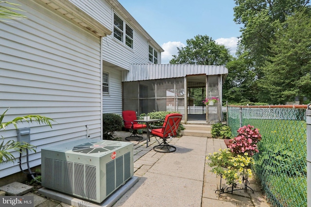 21 Hemmings Way, Lawnside, NJ 08045 - view of patio / terrace with a sunroom and outdoor dining space