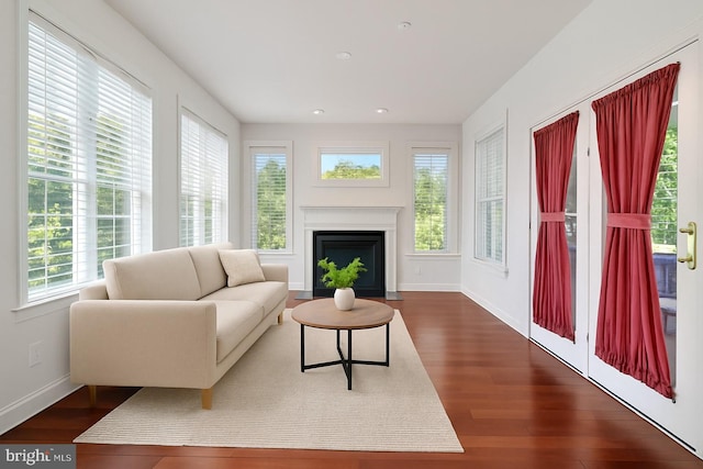 7730 Terraview Ct, Hanover, MD 21076 - living room with dark wood finished floors, a fireplace with flush hearth, and recessed lighting